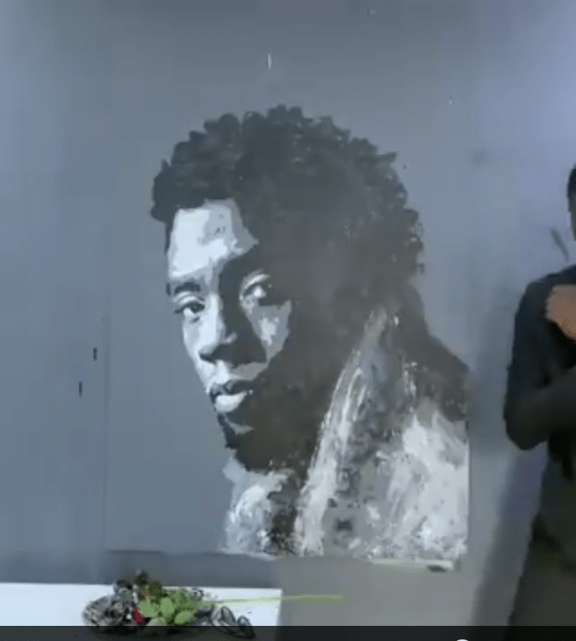Black and white painting of Chadwick Boseman by Boubou design